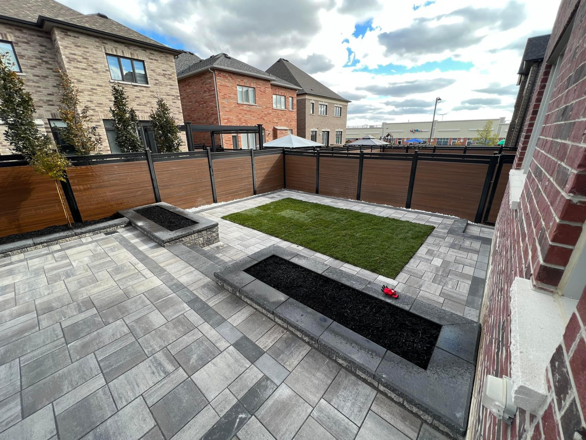 Patio, walkways and raised stone planters