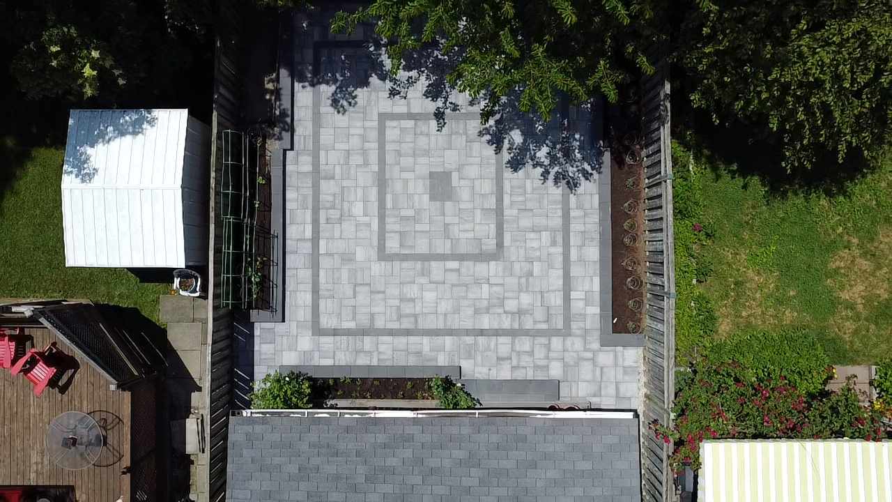A patio and garden beds from above