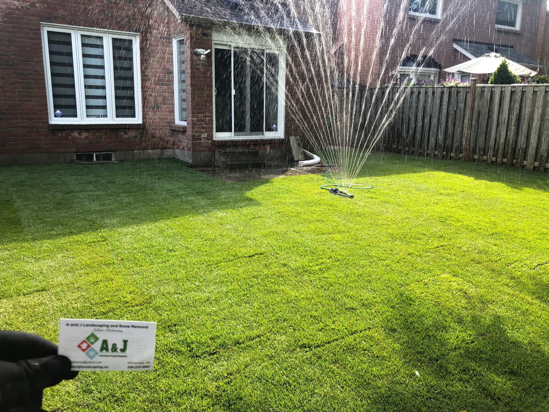 A new lawn getting its first watering