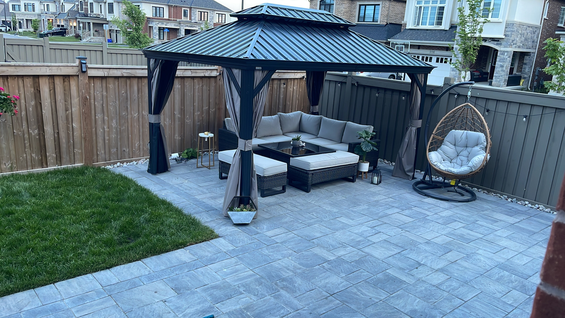 Backyard patio with a hardtop gazebo