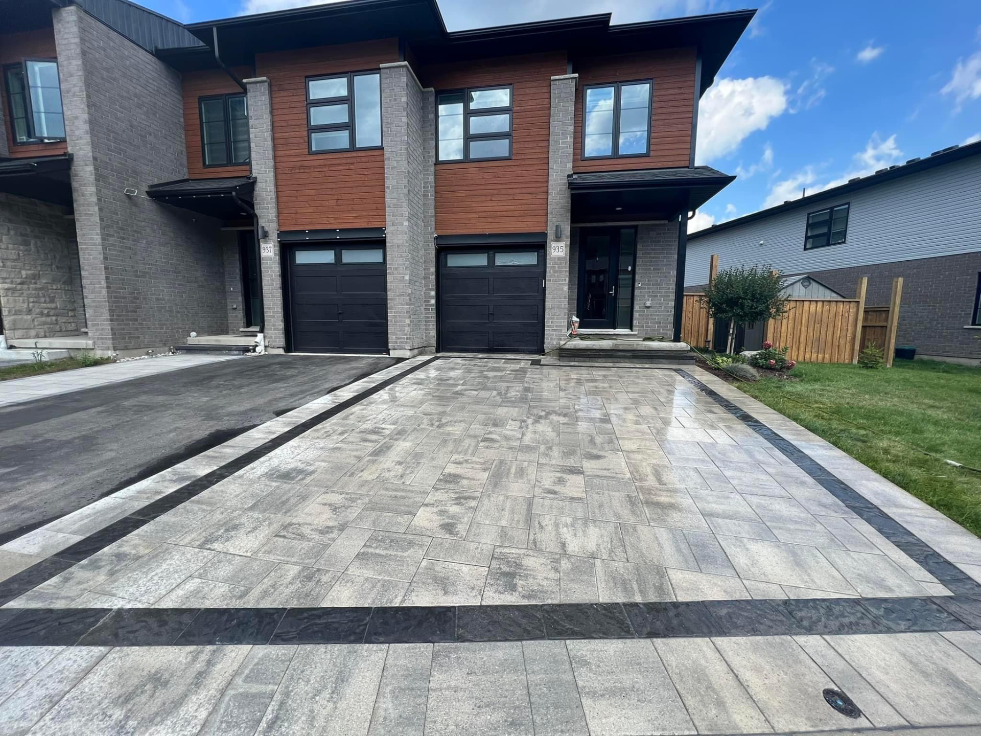 A paver driveway with contrasting borders