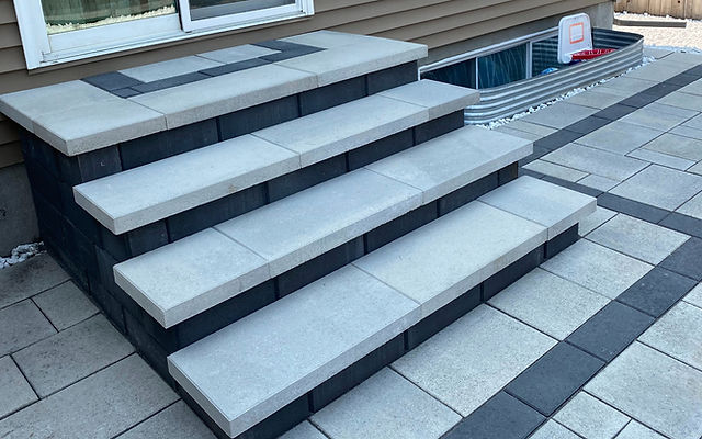 Stone steps down to a new patio